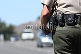Wallmonkeys Peel and Stick Wall Decals - A Police Officer Standing by Traffic - 18W x 12H Removable Graphic