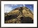 Volcanic rock statues, called maoi, dot the hillside on Rano Raraku Framed Art Poster...