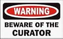 BEWARE OF THE CURATOR 11 oz. White Mug