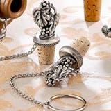 PAIR OF SILVER PLATED GRAPE BOTTLE STOPPERS
