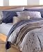 Serene Asian-inspired flora float over soft mauves, lending your room a peaceful elegance. 
Coordinates with the designer