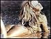 Pamela Anderson -Beads- 8x10 Autographed Photograph