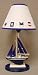 Blue and White Electrical Lamp with Wooden Sailboat on Base and