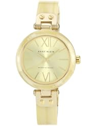 Anne Klein Womens 109652CHHN Gold-Tone Horn Plastic Bezel and Bangle Bracelet Watch