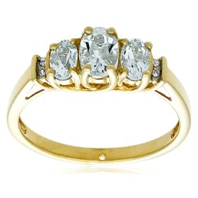 10k Yellow Gold March Birthstone 3-Stone Aquamarine Ring w Diamond Accent,... by Amazon.com Collection