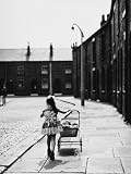 Little Girl Pushes Her Toy Pram Along a Street in Wigan Photographic Poster Print by Shirley Baker, 12x16