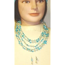 Click here to buy Four Strand Ivory Small Pearls Turquoise Blue Beads Medium Chain Necklace Earrings by Gita.