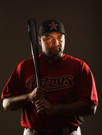 Houston Astros Photo Day, KISSIMMEE, FL - FEBRUARY 24: Carlos Lee Photographic Poster Print by Al Bello, 12x16