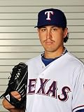 Surprise, AZ - February 28: Texas Rangers Photo Day - Derek Holland Photographic Poster Print by Jamie Squire, 24x32