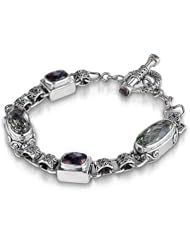 Sterling Silver This beautiful sterling silver bracelet by Sara Blaine features alternating green amethyst and smokey quartz as well as smokey quartz accents on the toggle clasp.