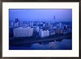 City Skyline from 17 Yanggakdo Hotel, P'Yongyang, North Korea Framed Photographic Poster Print by Tony Wheeler, 29x21