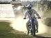 Daredevil Motorcyclist Evel Knievel Raising Dust after Completing Stunt Photographic ...