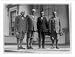 Historic Print (L): [Group portrait of, standing left to right: Frank Billings Kellogg, Warren G. Harding, C