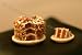 Miniature Layer Chocolate Torte with Slice on Plate