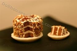 Miniature Layer Chocolate Torte with Slice on Plate