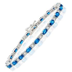 BEAUTIFUL BLUE TOPAZ and DIAMOND 14K BRACELET 5.99 CTS by