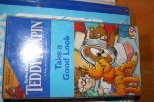 The New World of Teddy Ruxpin: Take a Good Look, Fully Animated Interactive Videocassette with Activity Book, By Yes Entertainment (The New World of Teddy Ruxpin) by Teddy Ruxpin