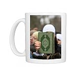 Koran being held during a Muslim demonstration, Paris, France, Europe Photo Mugs