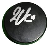 Logan Couture Autographed Hockey Puck, San Jose Sharks, Proof Photo of Logan Signing for Us.
