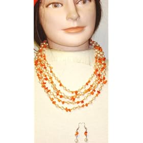 Click here to buy Four Strand Ivory Small Pearls Orange Beads Medium Chain Necklace Earrings by Gita.