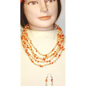 Click here to buy Four Strand Ivory Small Pearls Orange Beads Medium Chain Necklace Earrings by Gita.
