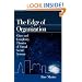 The Edge of Organization: Chaos and Complexity Theories of Formal Social Systems