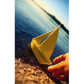 toile Hand launching toy yellow sailboat into water. est disperible en (L x H): 20 x 30 cm de P. ...
