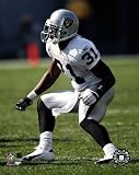 Phillip Buchanon '04/'05 action ©Photofile , 8x10