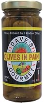 Olives In Pain - Olives Tortured By Five Kinds of Chiles. They May Not Be as Hot as Insanity Sauce But These Olives Will Torture You None the Less. You Can Even Eat The Chilis if You Dare!