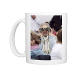 Elderly woman uses binoculars Photo Mugs