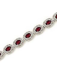 14kt Yellow Gold Oval Garnet Bracelet.