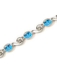 14K White Gold Oval Blue Topaz Bracelet by Jewelry Mountain