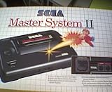 Revue Sega  / Console Master System 2 Pack Alex Kidd