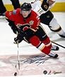 Dion Phaneuf Signed 8X10 Unframed - With Puck Vs Bos-V