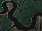 Aerial of Mill Creek Winding Through a Prairie of Phragmites Photographic Poster Print, 24x18