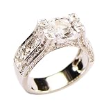 Modern Cushion Cut White Sapphire Engagement Ring with Four Channel-set Sapphire Supports