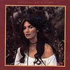Click here to buy Roses in the Snow by  Emmylou Harris .