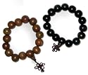 Asian wrist malas - pair of carved buddha meditation prayer beads - wood