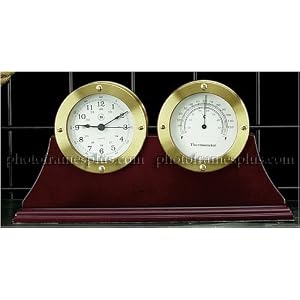 Gold Clock Thermometer on Wood