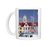 Colourful boats and picturesque gabled buildings along the quayside in Photo Mugs