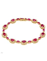18K Yellow Gold 9.55 CTW Ruby and 2.85 CTW Color I-J SI3 Diamond Ladies Bracelet. Length 7.25 in. Total Item weight 14.3 g.