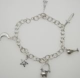 Sterling Silver Wicca Charm Bracelet with the tools of the trade.