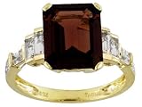 10KT 4.30CT GARNET AND .77CTW WHITE TOPAZ RING