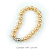 Single Strand 7-7.5 Inch 8MMGolden Shell Pearl Bracelet