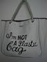 I'm Not a Plastic Bag - Logo Tote Bag - Brown Lettering