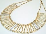 14K Yellow Gold Matte-Finish, Florentine-Finish Opera Necklace, Enhanced With Pave Set Diamonds, With a Inter-linked textured wavy bar design.