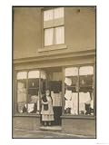 Woman Standing in the Doorway of a Modest Clothing Shop Photographic Print, 12