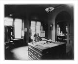 Historic Print (XL): [Henry A. Rucker, internal revenue collector, Atlanta, Georgia, seated at large desk in