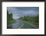 The Alaskan Highway Glistens from Rainfall Near Anchorage, Alaska Framed Photographic Poster Print by Stacy Gold, 21x17