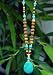 Snow Lion Rudraksha 108 Prayer Beads with Turquoise & Carnelian